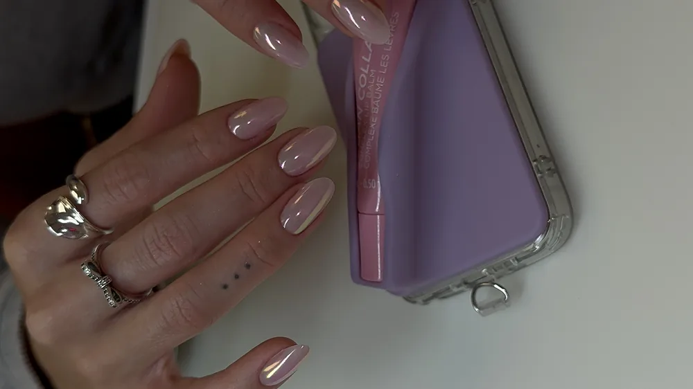 Pearlescent pink chrome almond gel manicure
