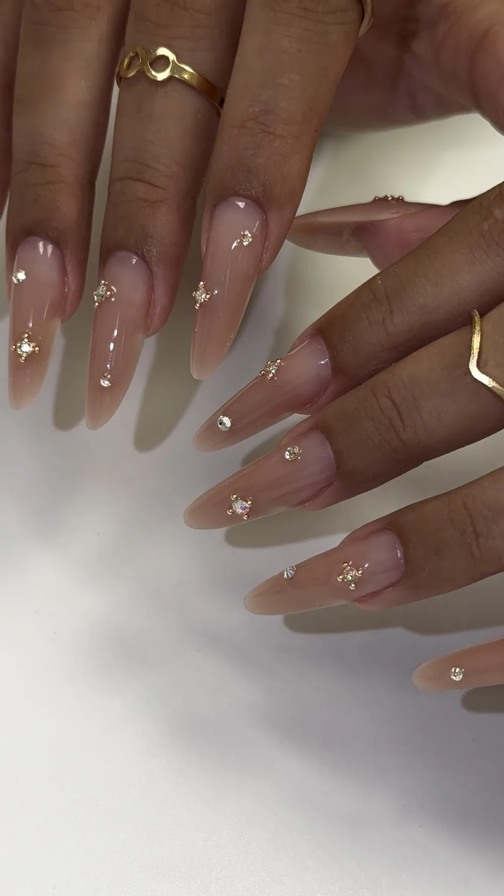 Natural nude extensions with scattered crystal and gold bead accents