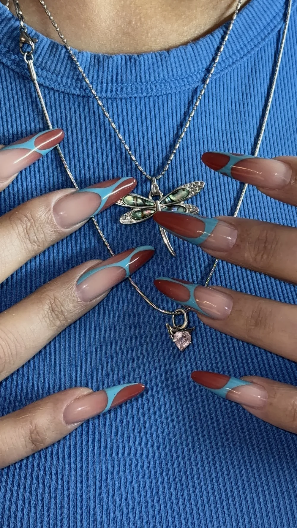 Long coffin nails with rust and teal double French tips